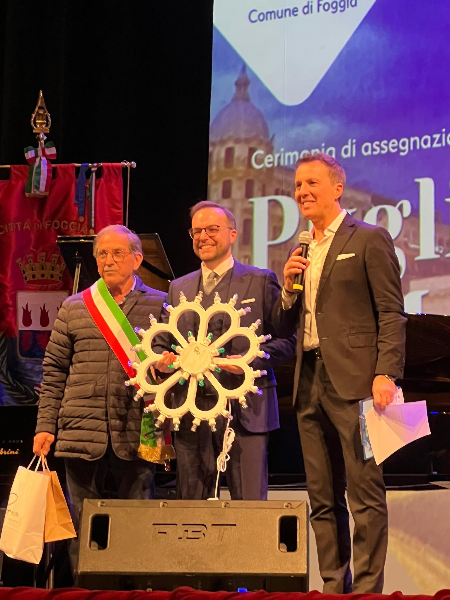 Researcher receiving a prize for his research